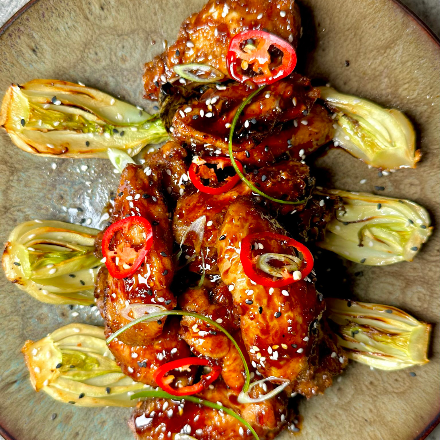 https://www.smokeandsear.world/wp-content/uploads/2022/12/Ninja-Woodfire-Asian-Style-Sweet-and-Sticky-Chicken-Wings-with-Air-Fried-Pak-Choi-Photo-16.jpg
